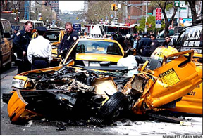 Burned-out taxi wreck