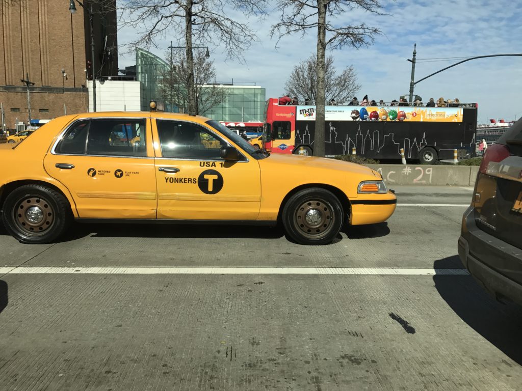 Yonkers-licensed taxi with NYC T logo markings